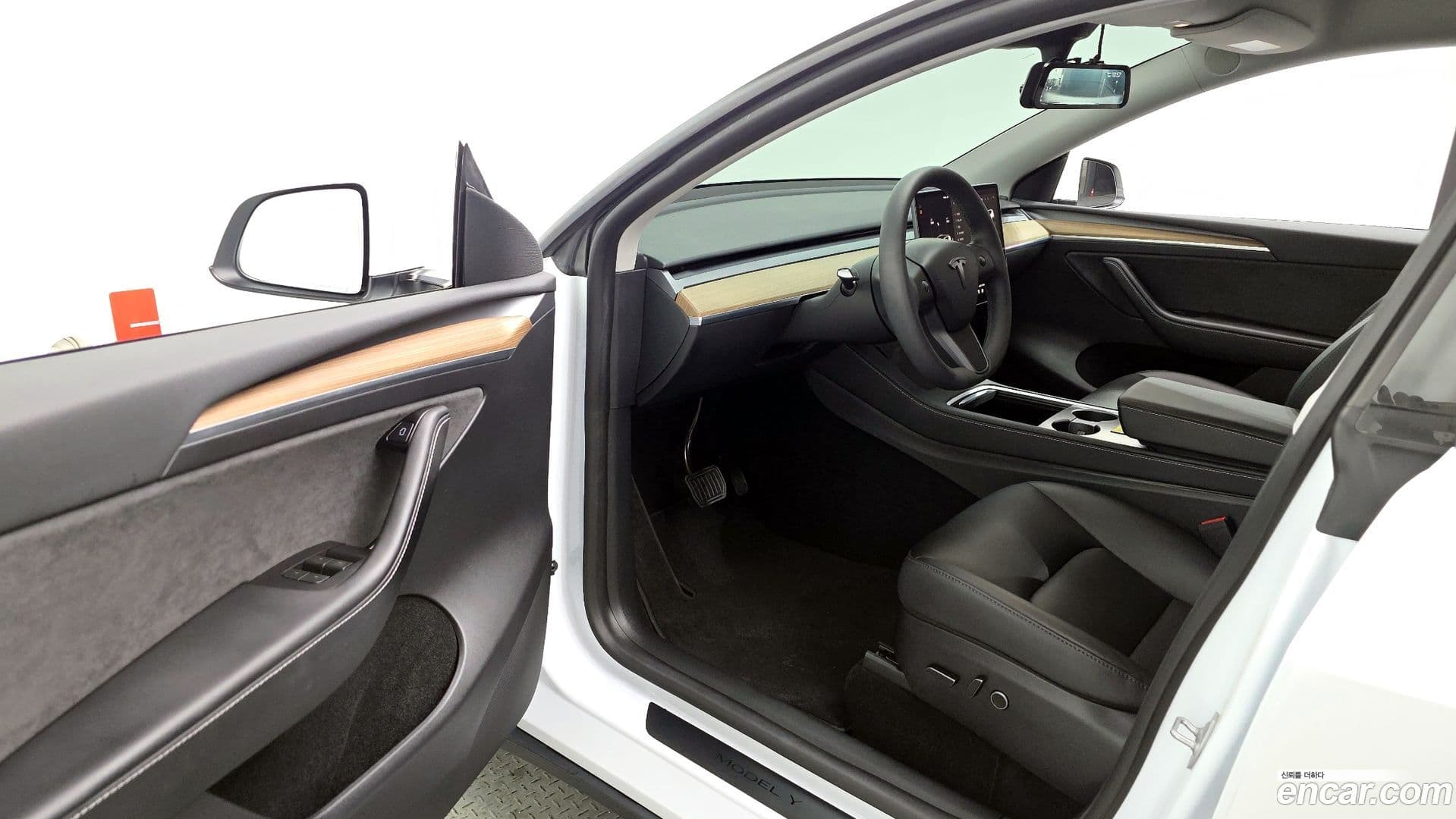 Main__Slider__Photo:Model Y Tesla 2023.7-10