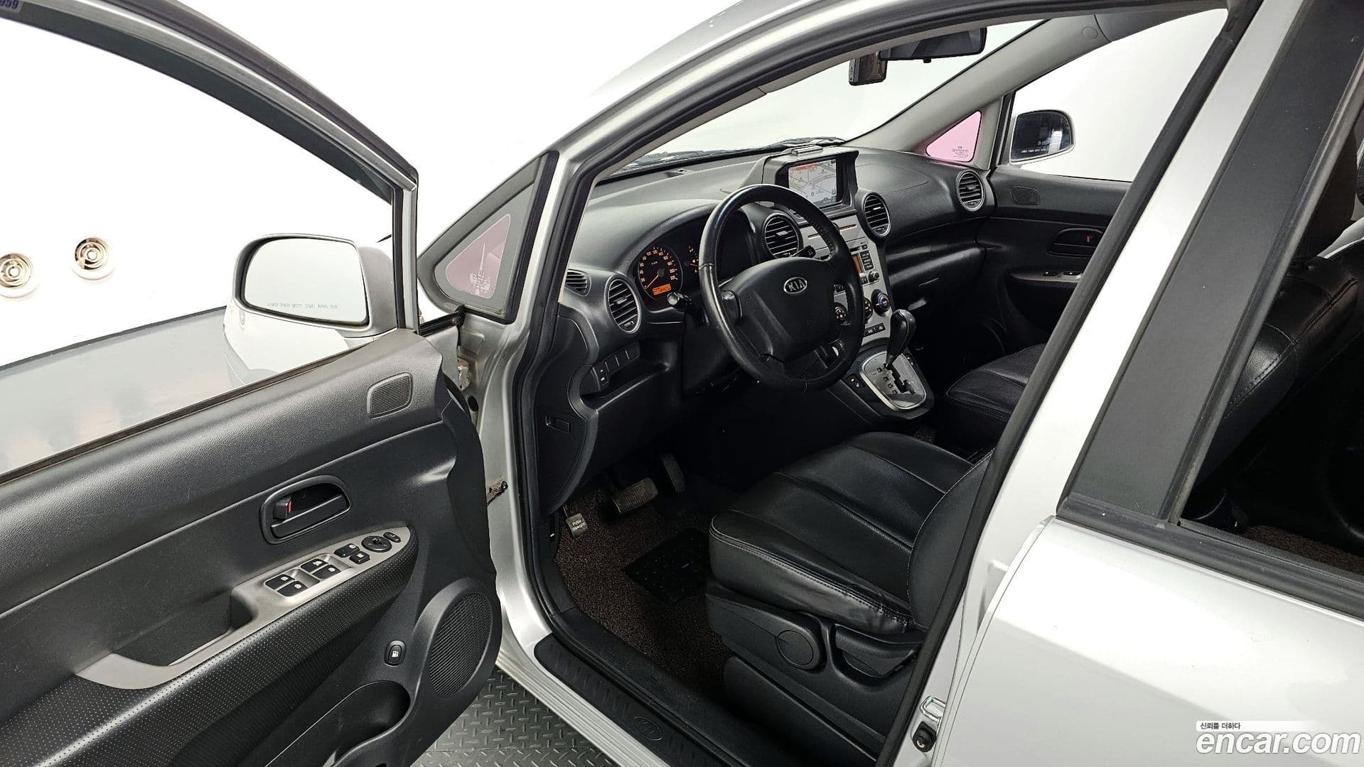 Main__Slider__Photo:Carens Kia 2009.1-10