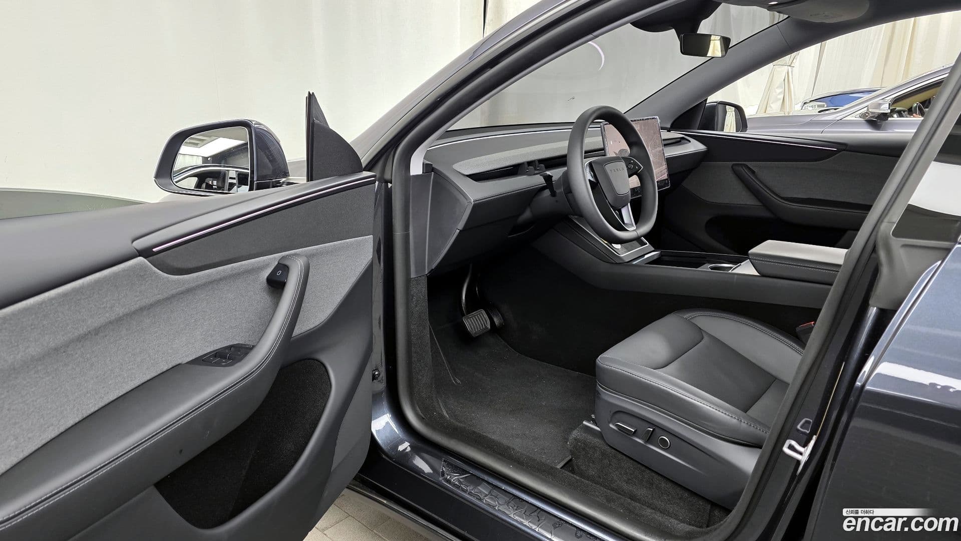 Main__Slider__Photo:Model Y Tesla 2025.4-9