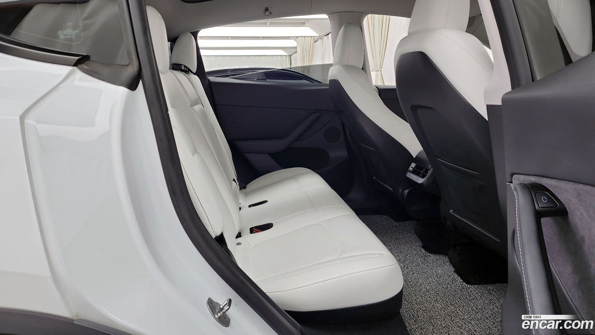 Main__Slider__Photo:Model Y Tesla 2023.10-11