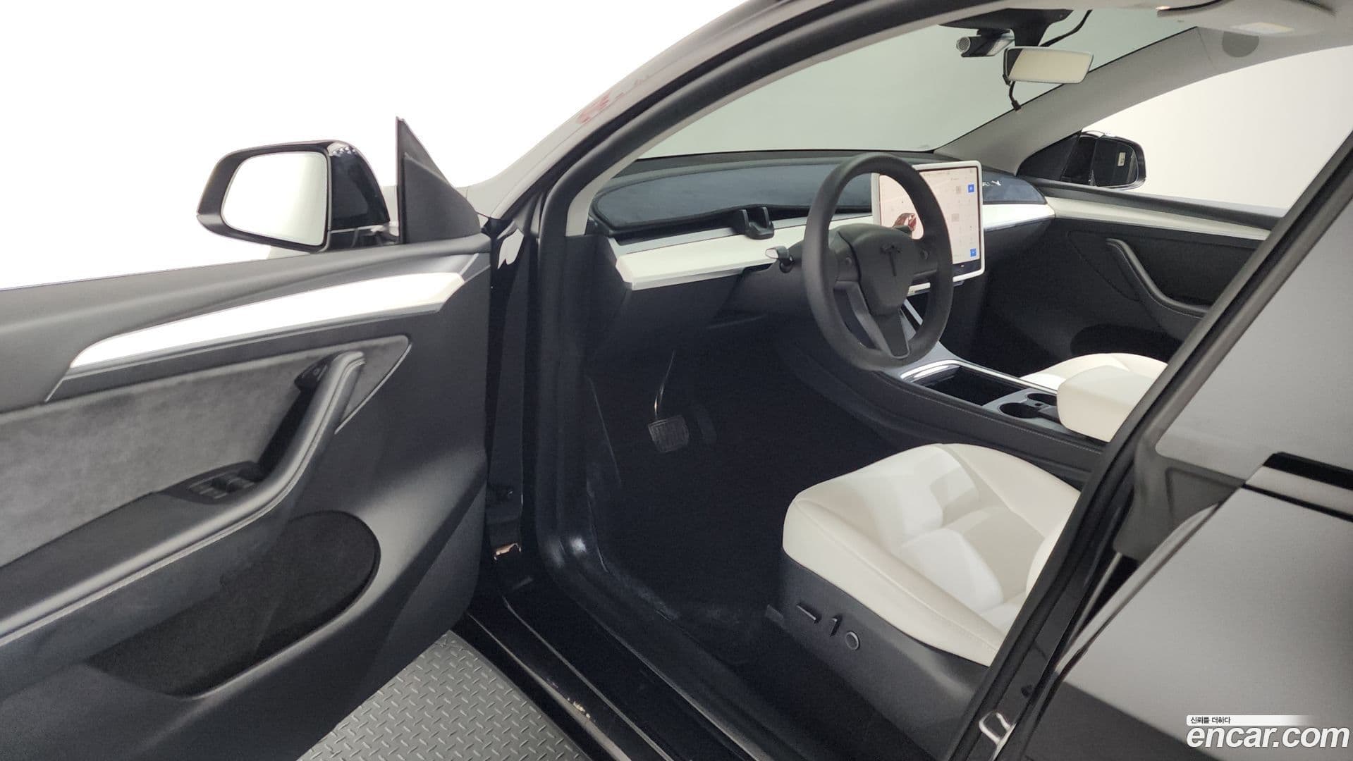 Main__Slider__Photo:Model Y Tesla 2023.9-9