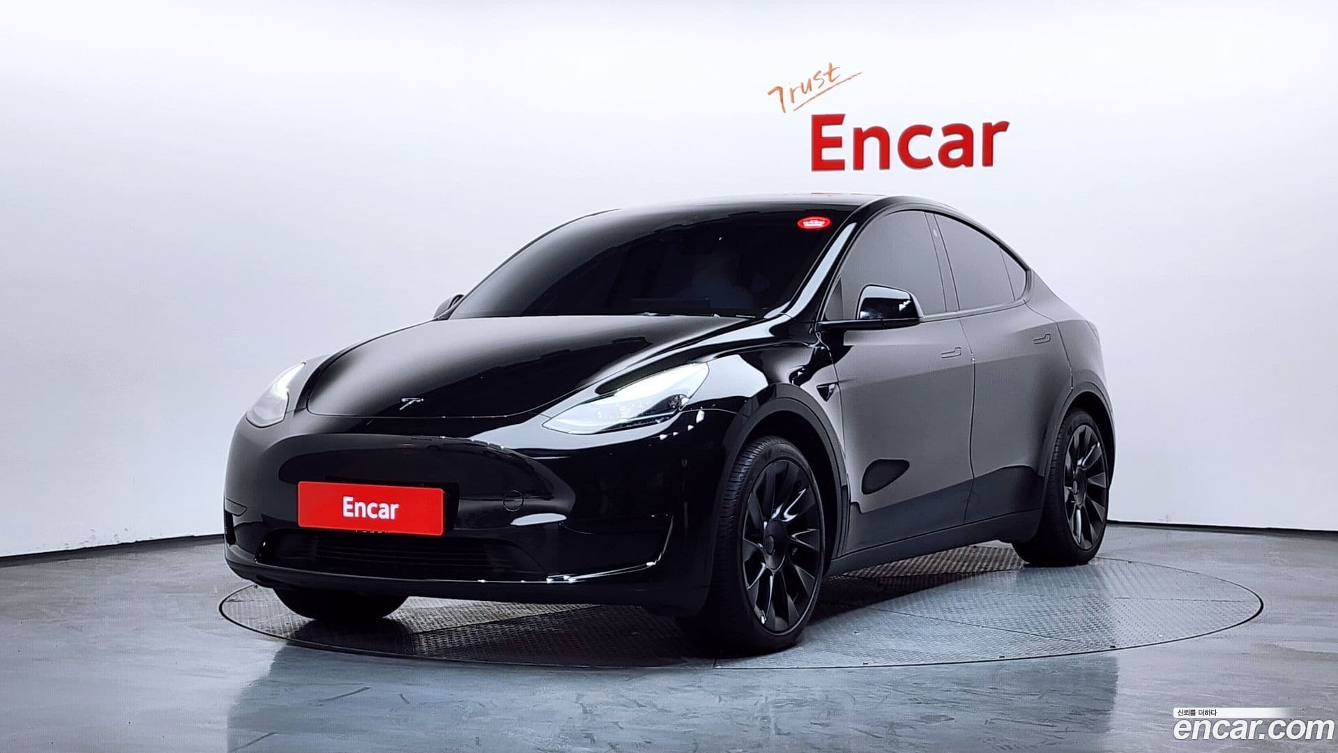 Main__Slider__Photo:Model Y Tesla 2023.10-0